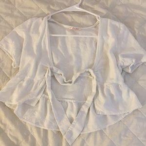 i am selling a cute little white top that could go on a tank top or any cutetop